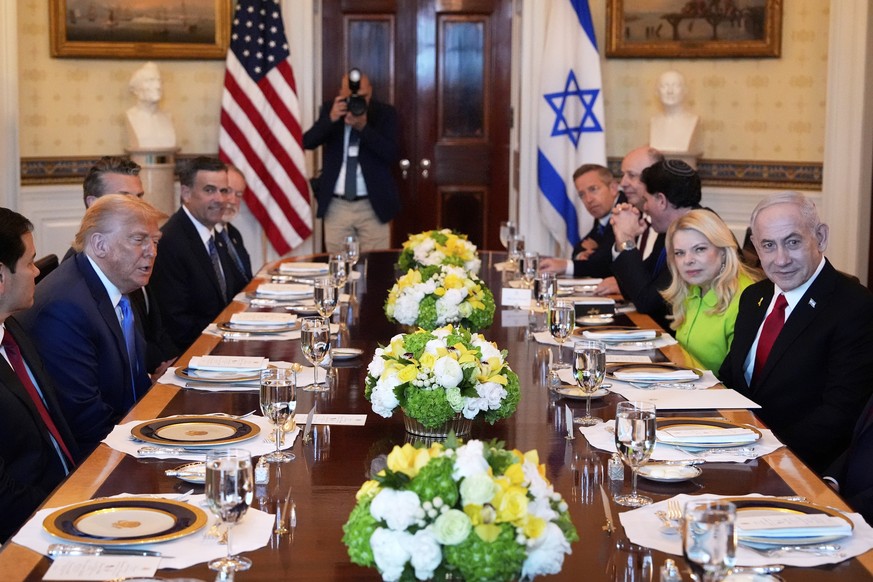 President Donald Trump, second left, meets with Israel&#039;s Prime Minister Benjamin Netanyahu, right, in the Blue Room of the White House, Monday, July 7, 2025, in Washington. (AP Photo/Alex Brandon ...