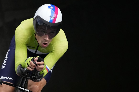 Primoz Roglic of Slovenia competes during the men's cycling individual time trial at the 2020 Summer Olympics, Wednesday, July 28, 2021, in Oyama, Japan. (AP Photo/Christophe Ena)