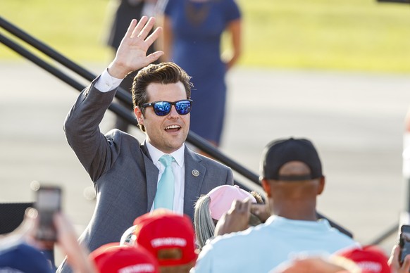 epa08769184 US Representative for Florida, Republican Matt Gaetz, waves to the crowd while waiting for US President Donald J. Trump during a campaign rally in Pensacola, Florida, USA, on 23 October 20 ...