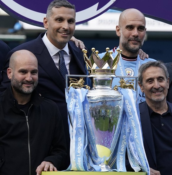 Manchester, England, 21st May 2023. Back row from left Ferran Soriano, Chairman Khaldoon Al Mubarak, Josep Guardiola manager, Not named and Txiki Begiristain - Director of Football front Manel Estiart ...