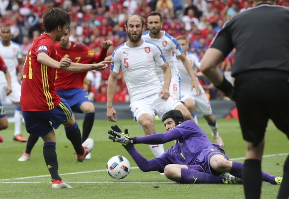 Czech Republic goalkeeper Petr Cech saves on Spain&#039;s David Silva during the Euro 2016 Group D soccer match between Spain and the Czech Republic at the Stadium municipal in Toulouse, France, Monda ...