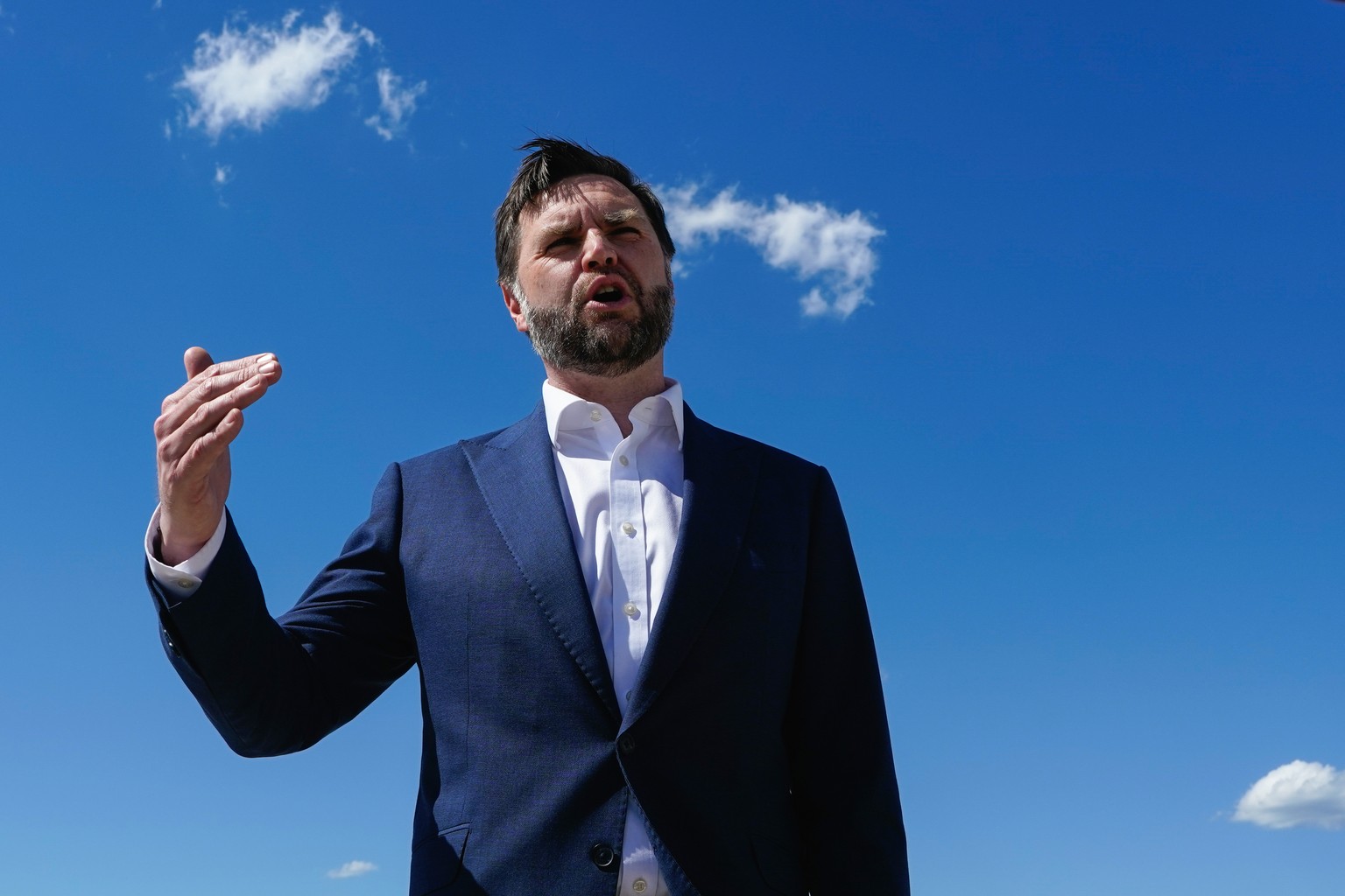 Vice President JD Vance speaks to reporters at Joint Base Andrews, Md., Saturday, June 20, 2026, en route to Switzerland. (Elizabeth Frantz/Pool Photo via AP)
Vance
