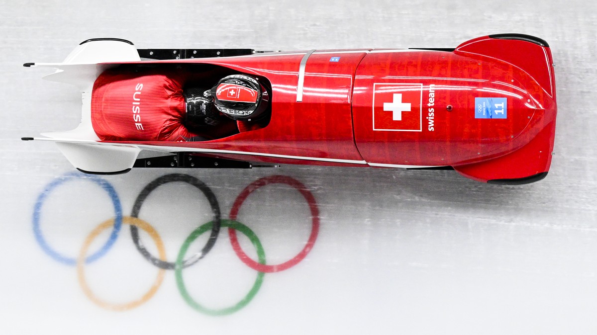 Michael Vogt and Sandro Michel of Switzerland in action during the Bobsleigh Men's Two-Man Heat 1 at the 2022 Olympic Winter Games in Yanqing, China, on Monday, February 14, 2022. (KEYSTONE/Jean- ...