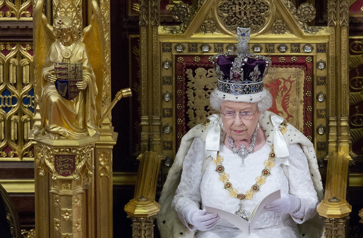 Britain's Queen Elizabeth II wearing the Imperial State Crown as she delivers The Queen's Speech to Parliament in the House of Lords during the official State Opening of Parliament in London ...