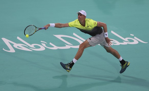 South Africa&#039;s Kevin Anderson returns the ball to Austria&#039;s Dominic Thiem during the second day of the Mubadala World Tennis Championship in Abu Dhabi, United Arab Emirates, Friday, Dec. 29, ...
