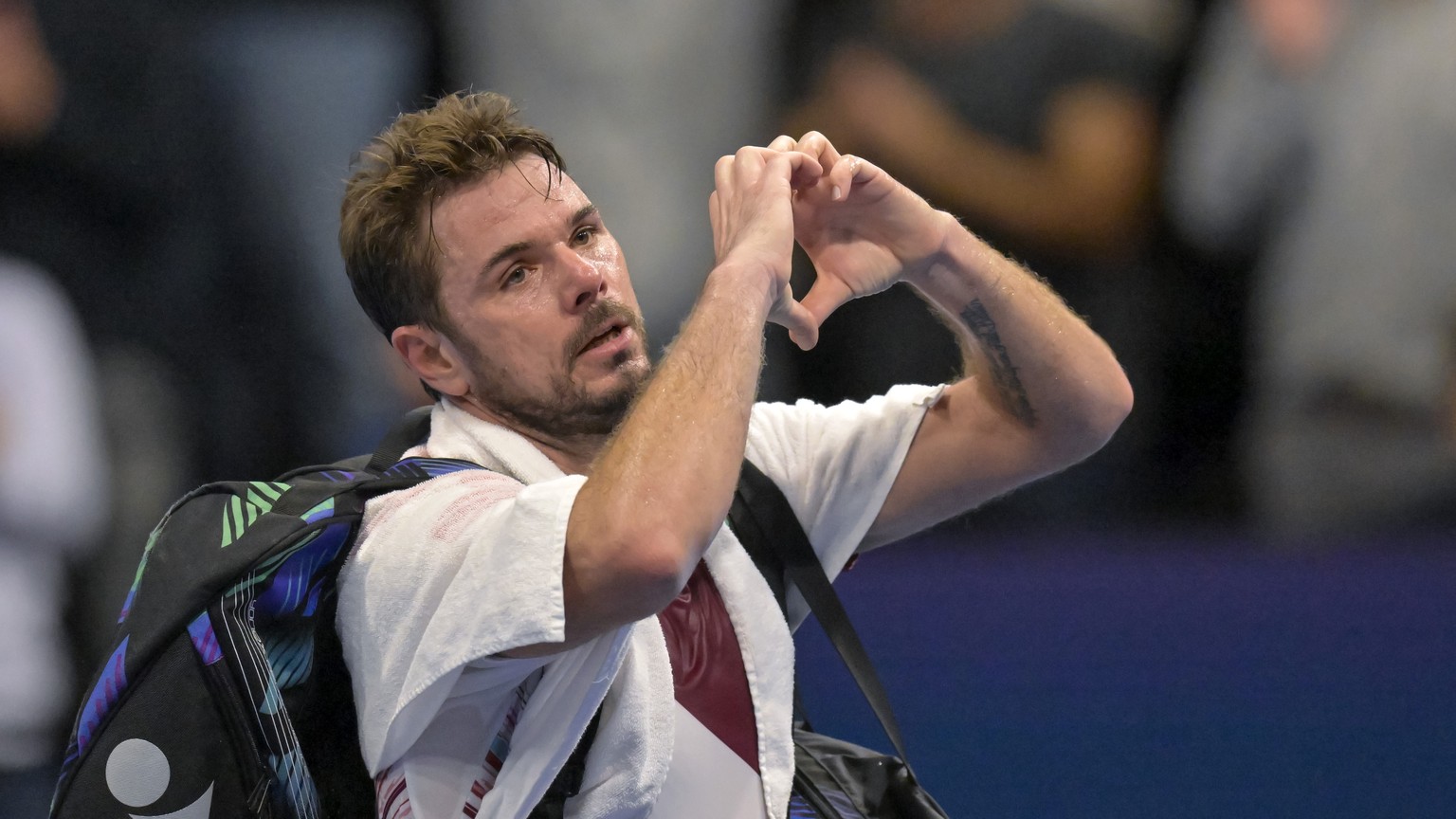 Switzerland&#039;s Stan Wawrinka gestures to the audience after losing his quarter final match against Spain&#039;s Roberto Bautista Agut at the Swiss Indoors tennis tournament at the St. Jakobshalle  ...