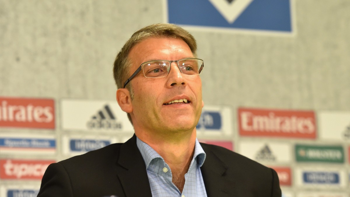 HAMBURG, GERMANY - OCTOBER 01: Peter Knäbel talks to the media as he is announced as the new director of professional football for Hamburger SV at Imtech Arena on October 1, 2014 in Hamburg, Germany.  ...