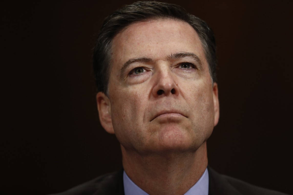 FILE- In this May 3, 2017, file photo, FBI Director James Comey listens on Capitol Hill in Washington. Comey's memo relating President Donald Trump’s request to shut down an investigation of his  ...