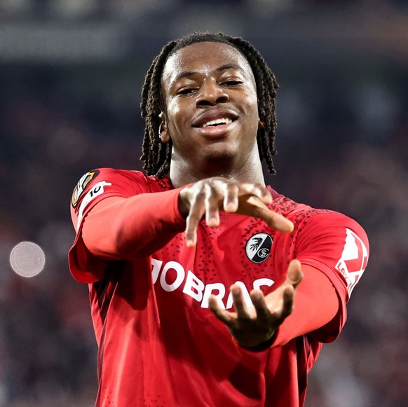 epa12939776 Johan Manzambi of Freiburg poses after scoring the 2-0 goal during the UEFA Europa League semi-finals 2nd leg match SC Freiburg against SC Braga, in Freiburg, Germany, 07 May 2026. EPA/RON ...