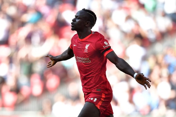 epa09893135 Liverpool's Sadio Mane celebrates after scoring during the English FA Cup semi final match between Manchester City and Liverpool at Wembley Stadium, London, Britain, 16 April 2022.  EPA/VINCENT MIGNOTT