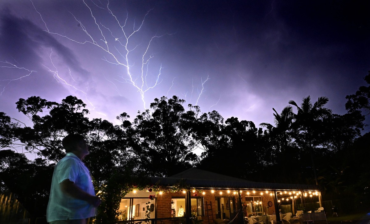 THUNDERSTORM GOLD COAST, An electrical storm is seen at Reedy Creek on the Gold Coast Monday, December 25, 2023. A woman has died after being struck by a tree after winds of 100 kph lashed the Gold Co ...