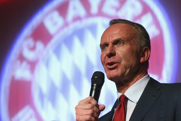 Bayern Munich CEO Karl-Heinz Rummenigge speaks at the team&#039;s after-match party in Berlin May 18, 2014. Bayern Munich restored their undisputed dominance in Germany when they beat rivals Borussia  ...