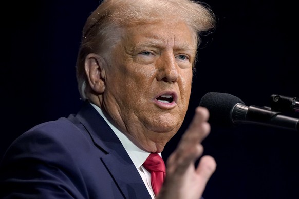 Former President Donald Trump addresses an audience during a campaign event, Monday, Oct. 9, 2023, in Wolfeboro, N.H. (AP Photo/Steven Senne)