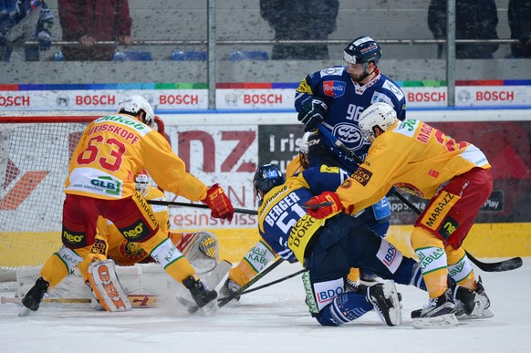 From left, Tiger&#039;s player Dan Weisskopf, Ambri&#039;s player Sven Berger, Ambri&#039;s player Adrien Lauper and Tiger&#039;s player Maxime Macenauer during the relegation game of National League  ...