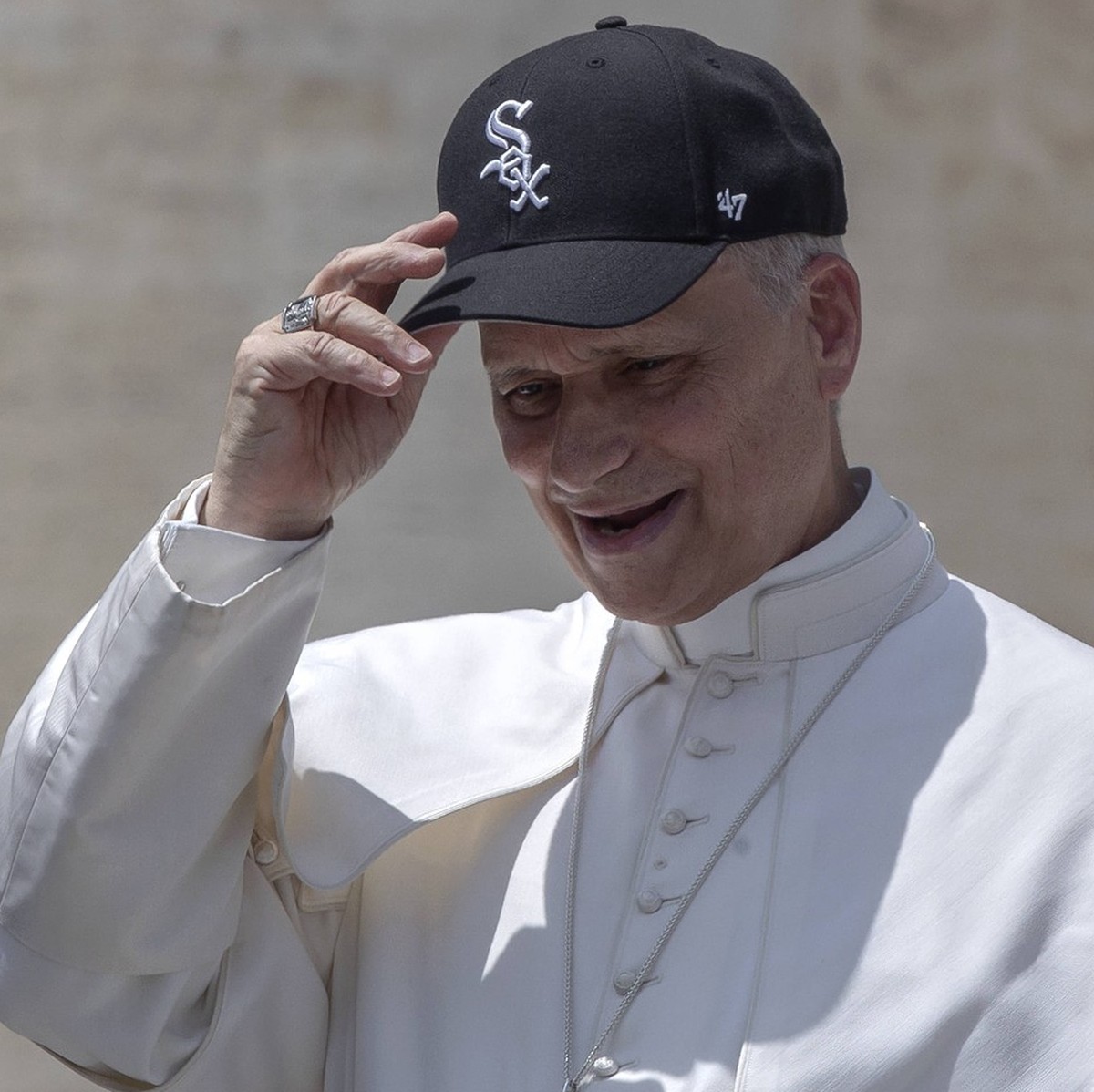 June 11, 2025, Vatican City, Vatican: Pope Leo XIV wears a Chicago White Sox baseball team cap given to him by a newly wedded couple during his weekly general audience in St. Peter s square. Vatican C ...