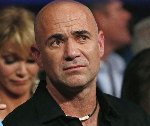 FILE - In this May 2, 2015, file photo, Andre Agassi is shown in the crowd before the world welterweight championship bout between Floyd Mayweather Jr., and Manny Pacquiao, in Las Vegas. Andre Agassi  ...