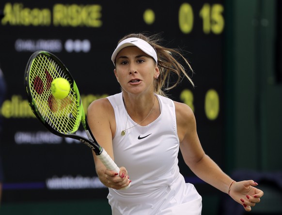 Switzerland&#039;s Belinda Bencic returns to United States&#039; Alison Riske in a Women&#039;s singles match during day six of the Wimbledon Tennis Championships in London, Saturday, July 6, 2019. (A ...