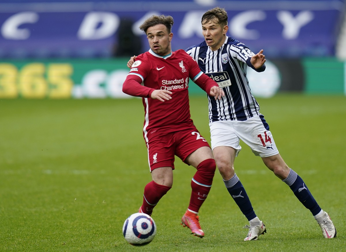 Liverpool's Xherdan Shaqiri, left, duels for the ball with West Bromwich Albion's Conor Townsend during the English Premier League soccer match between West Bromwich Albion and Liverpool at  ...