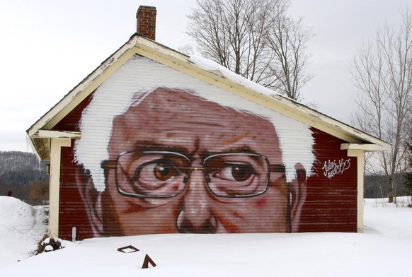 epa08266471 A spray painted mural of presidential candidate Senator Bernie Sanders on the side of a building in Kirby, Vernont USA, 03 March 2020. On Super Tuesday Fourteen states are holding their pr ...