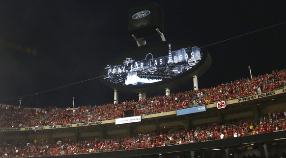 epa06240822 A message on the video board reads &#039;Pray For Las Vegas&#039; during a moment of silence before the Washington Redskins game against the Kansas City Chiefs at their Monday Night NFL fo ...