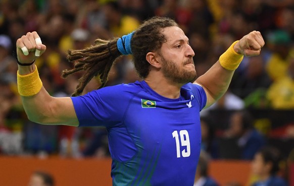 epa05475048 Brazil&#039;s Fabio Chiuffa celebrates a goal during the men&#039;s preliminary round match between Brazil and Germany for the Rio 2016 Olympic Games handball tournament at the Future Aren ...