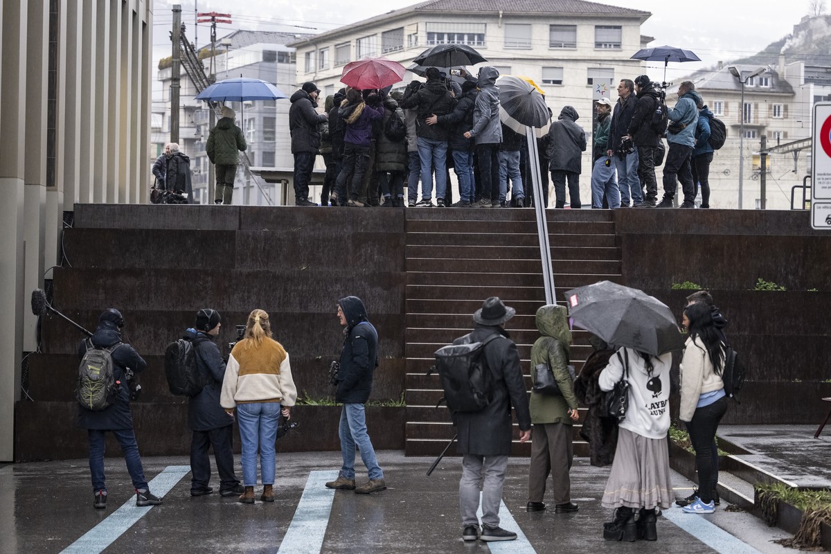 Journalists interview friends and family members of victims ahead of the hearing before the public prosecutor of the canton of Valais of the owners of "Le Constellation" bar in Crans-Montana ...