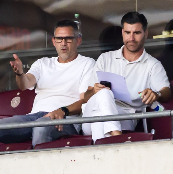 The upcoming Servette coach, Jocelyn Gourvennec, left, observes the match from grandstand, during the Super League soccer match of Swiss Championship between Servette FC, SFC, and Grasshopper Club Zue ...