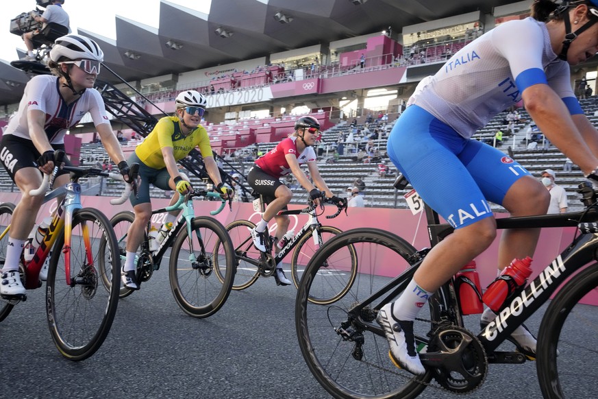 Marlen Reusser of Switzerland(35) competes during the women&#039;s cycling road race at the 2020 Summer Olympics, Sunday, July 25, 2021, in Oyama, Japan. (AP Photo/Christophe Ena)