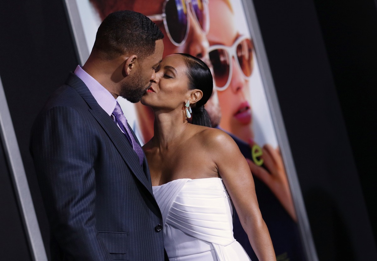 Will Smith, left, and Jada Pinkett Smith arrive at the world premiere of "Focus" at the TCL Chinese Theatre on Tuesday, Feb. 24, 2015, in Los Angeles. (Photo by John Salangsang/Invision/AP)