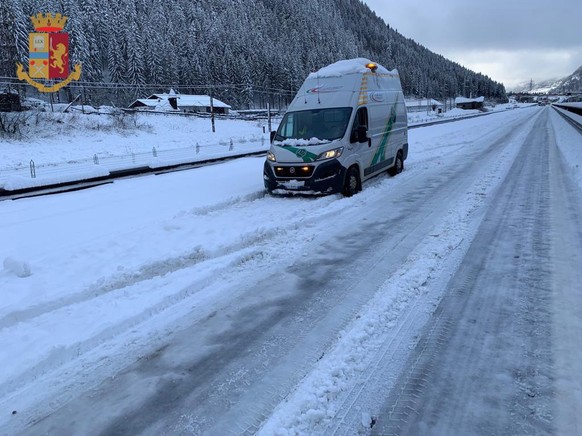 epa07339738 A handout photo made available by the Italian Police shows trucks on the Brennero motorway closed in northern direction between Chiusa and Vipiteno, as the road is blocked for lorries due  ...