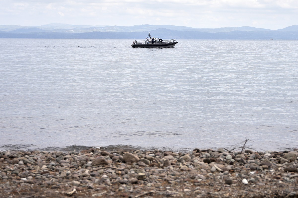 A Frontex vessel takes part in a search and rescue operation, after the capsizing of a boat carrying migrants, off the coast on the northeastern Aegean Sea island of Lesbos, Greece, Thursday, April 3, ...