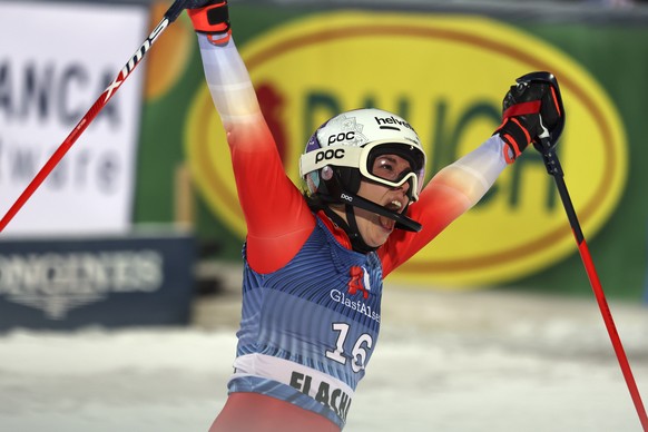 Switzerland&#039;s Michelle Gisin reacts after completing an alpine ski, women&#039;s World Cup slalom in Flachau, Austria, Tuesday, Jan.16, 2024. (AP Photo/Marco Trovati)