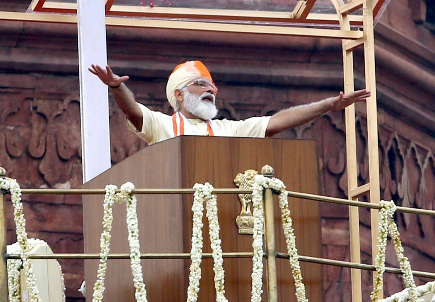 epa08604768 A handout photo made available by the Indian Ministry of Defence shows Indian Prime Minister Narendra Modi addressing the nation at Red Fort on the occasion of 74th Independence Day in New ...