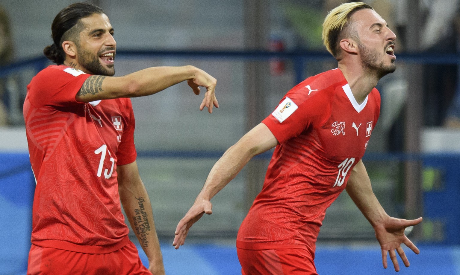 Switzerland&#039;s forward Josip Drmic, right, celebrates after scoring a goal with Switzerland&#039;s defender Ricardo Rodriguez, left, during the FIFA World Cup 2018 group E preliminary round soccer ...