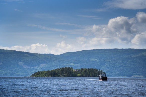 epa09356258 (FILE) - A boat transports people and goods to and from the island Utoya, in Tyrifjorden in Hole municipality, Norway, 17 June 2021 (reissued 21 July 2021). Norway marks 10 years since 22  ...