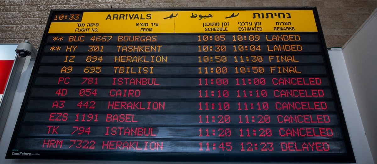 TEL AVIV, ISRAEL - JULY 24: The arrivals gate board shows cancelled flights at terminal three at Ben Gurion Airport on July 24, 2014 in Tel Aviv, Israel. The Federal Aviation Administration recently h ...