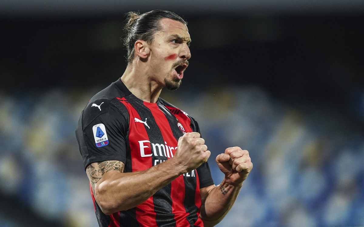 AC Milan's Zlatan Ibrahimovic celebrates scoring during the Serie A soccer match between Napoli and AC Milan, at the San Paolo Stadium in Naples, Italy, Sunday, Nov. 22, 2020. (Alessandro Garofal ...