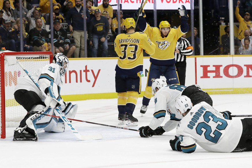 Nashville Predators right wing Viktor Arvidsson (33), of Sweden, and center Matt Duchene (95) celebrate after Roman Josi scored a goal against San Jose Sharks goaltender Martin Jones (31) during the s ...