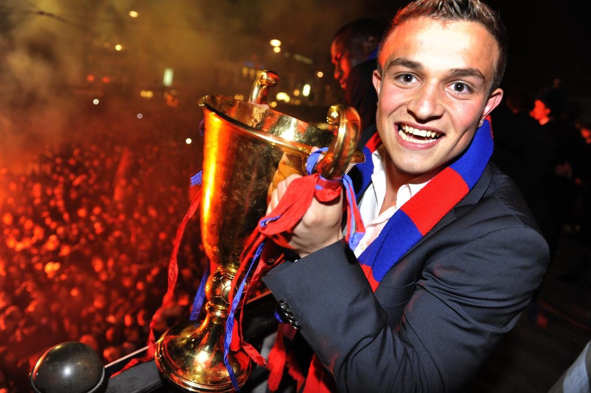 FC Basel's Xherdan Shaqiri celebrates on the Barfuesserplatz after winning the Swiss Super League soccer championship in the city center of Basel, Switzerland, Sunday, May 16, 2010. (KEYSTONE/Geo ...