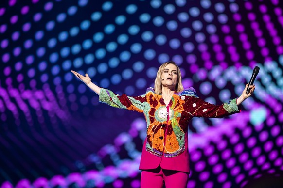 Host Hazel Brugger reacts during the dress rehearsal and preview show of the final at the 69th Eurovision Song Contest in Basel, Switzerland, on Friday, May 16, 2025. (KEYSTONE/Georgios Kefalas)
