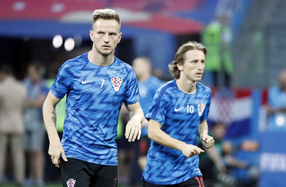 epa06855978 Ivan Rakitic of Croatia (L) and Luka Modric of Croatia warm up prior the FIFA World Cup 2018 round of 16 soccer match between Croatia and Denmark in Nizhny Novgorod, Russia, 01 July 2018.
 ...