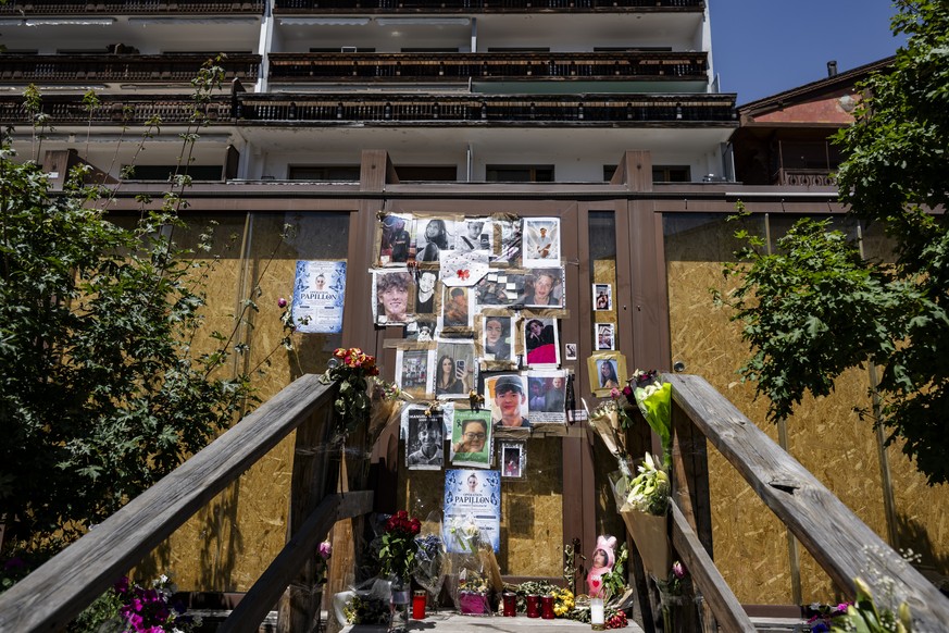 epaselect epa13100250 Portraits of the young victims are displayed at the entrance of the bar Le Constellation six months after a deadly fire, in Crans-Montana, Switzerland, 09 July 2026. Forty-one pe ...