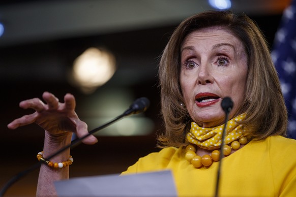 epa08479440 Speaker of the House Nancy Pelosi responds to a question from the news media during a press conference in the US Capitol in Washington, DC, USA, 11 June 2020. Speaker Pelosi discussed COVI ...