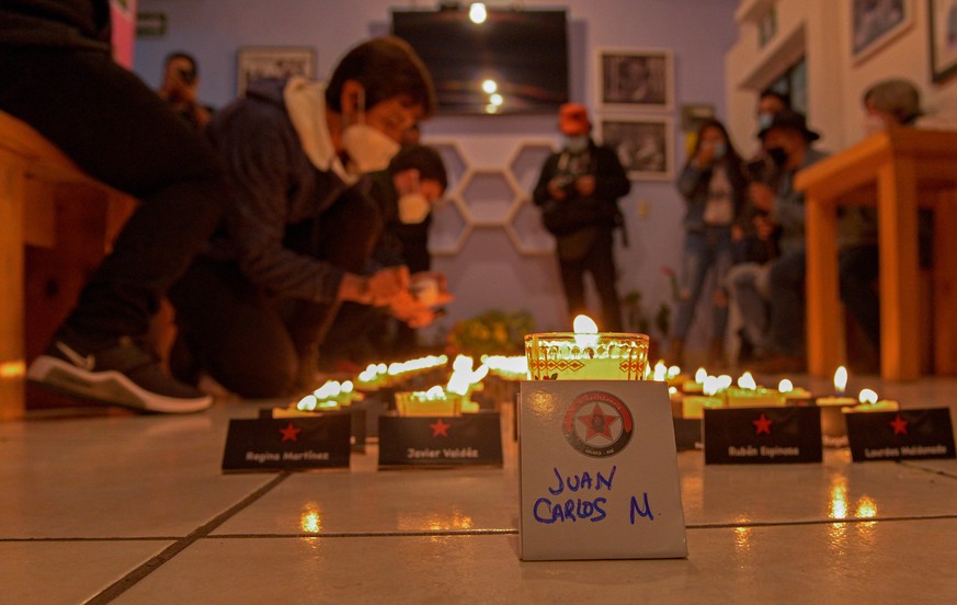 epa09802687 Journalists from Chiapas, Tabasco, and Mexico City, light a hundred candles during the inauguration of the National Meeting of Journalists, in the municipality of San Cristobal de Las Casa ...