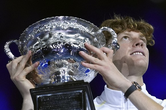 FILE -Jannik Sinner of Italy holds the Norman Brookes Challenge Cup aloft after defeating Alexander Zverev of Germany in the men&#039;s singles final at the Australian Open tennis championship in Melb ...