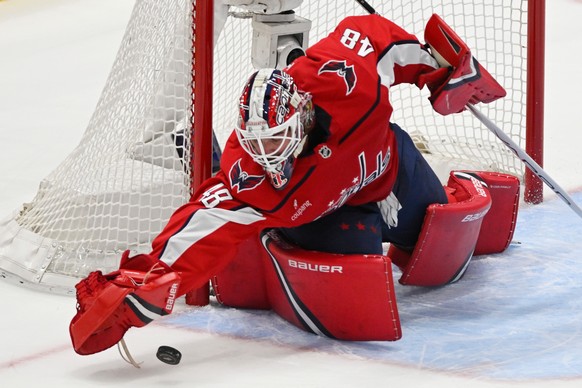 Washington Capitals goaltender Logan Thompson (48) stops a puck during the first period of an NHL hockey game against the St. Louis Blues, Wednesday, Nov. 5, 2025, in Washington. (AP Photo/John McDonn ...