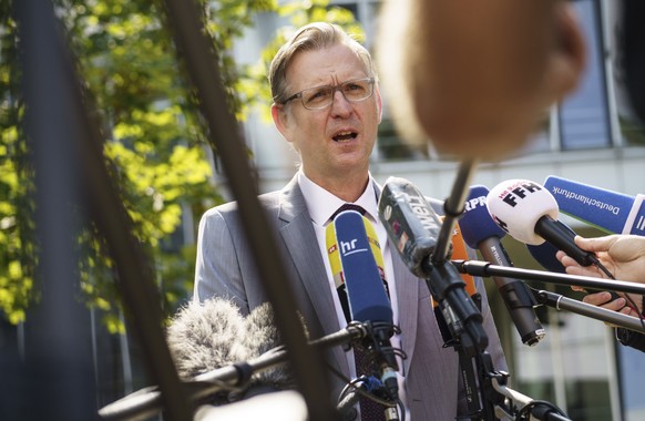 Chief Public Prosecutor Robert Hartmann speaks to the media, outside building L201 on the Lichtwiese campus of the Technical University Darmstadt, in Darmstadt, Germand, Tuesday, Aug. 24, 2021. Author ...