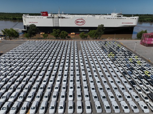 The BYD Changzhou car carrier is docked at Terminal Zarate in the Buenos Aires province of Argentina, Tuesday, Jan. 20, 2026, where hybrid and electric vehicles shipped from China are parked next to t ...