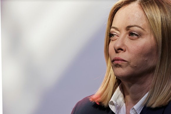 Italian Prime Minister Giorgia Meloni looks on before posing for a family picture as part of the so-called Coalition of the willing summit at the Elysee Palace, Thursday, March 27, 2025 in Paris. (Lud ...