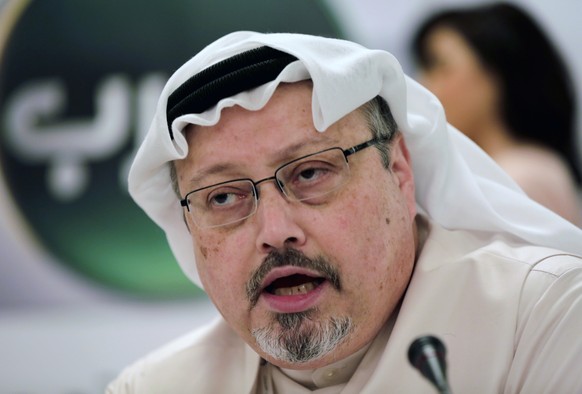 FILE - In this Dec. 15, 2014, file photo, Saudi journalist Jamal Khashoggi speaks during a press conference in Manama, Bahrain. More than a dozen global news organizations including The Associated Pre ...